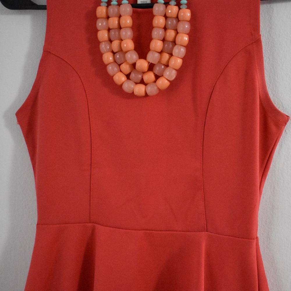 Coral Peplum Blouse